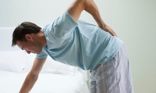 causas de dores nas costas nos homes